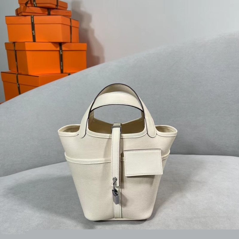 H**mes shopping bags